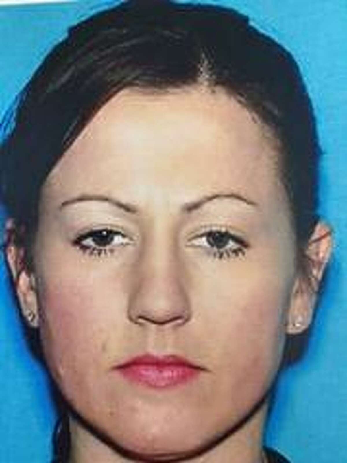 Jasmine Mitchell, daughter of slain San Francisco porn tycoon Artie Mitchell, was sentenced to 27 months in prison for identity theft and credit card fraud in a San Francisco federal court, Oct. 15, 2014.