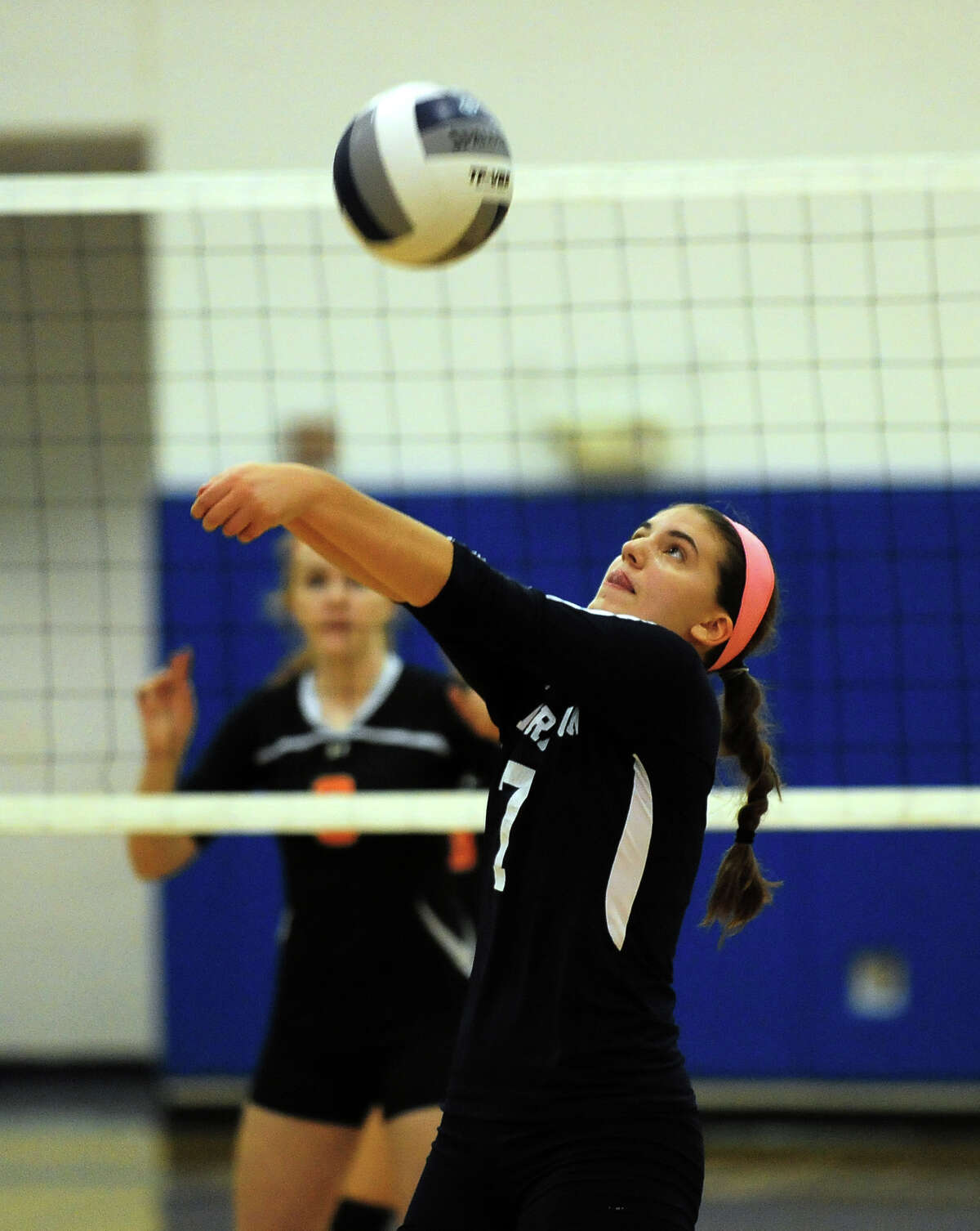 Lauralton Hall's Ally Grabler bumps the ball, during girls volleyball action against Shelton in Milford, Conn. on Wednesday October 15, 2014.