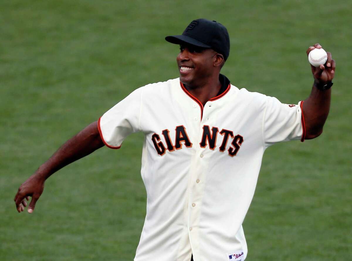 Former Giants player Barry Bonds throws the ceremonial first pitch during Game 4 of the NLCS at AT&T Park on Wednesday, Oct. 15, 2014 in San Francisco, Calif.