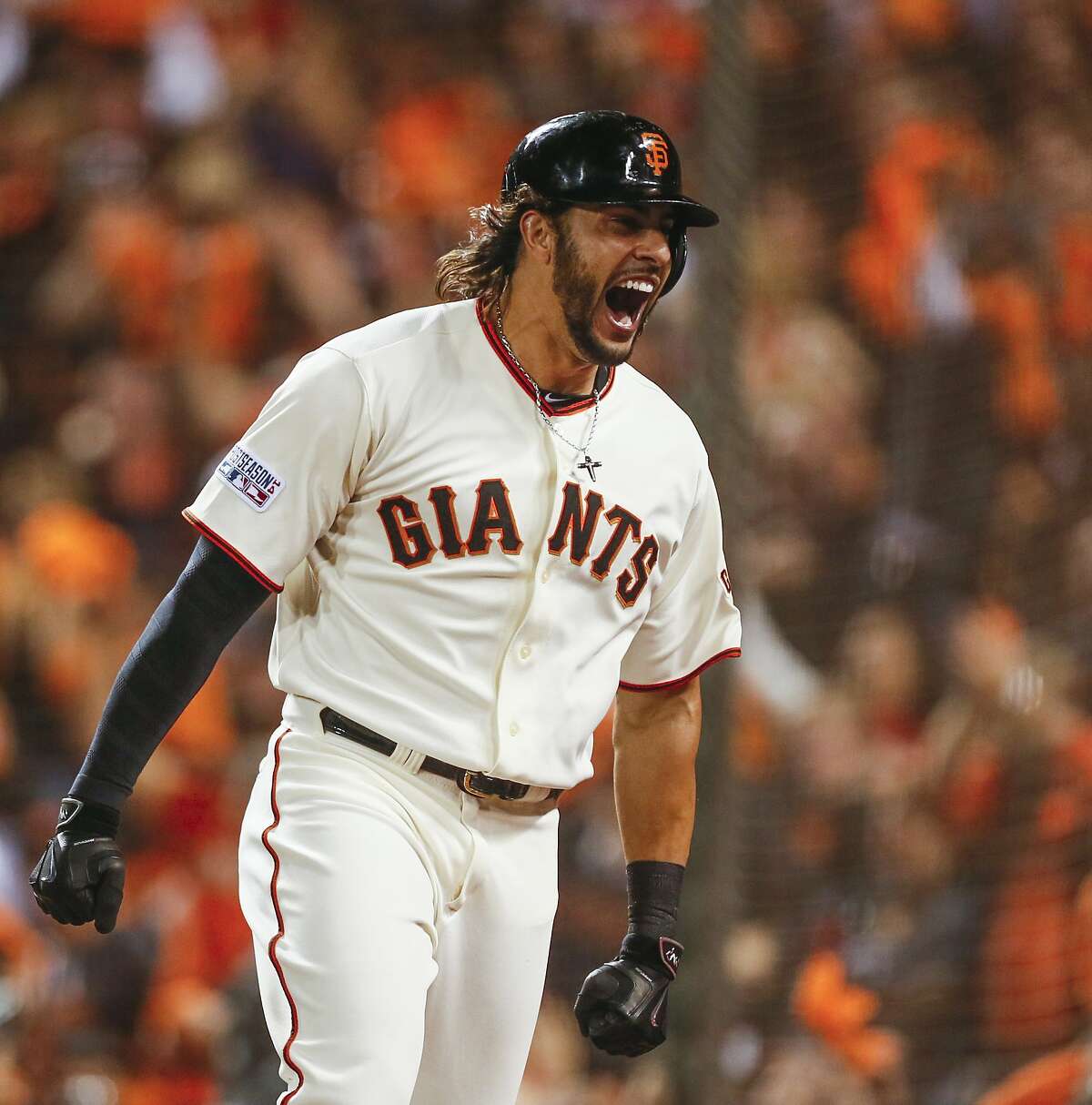 Giants Michael Morse celebrates a solo homer in the eighth inning during Game 5 of the NLCS at AT&T Park on Thursday, Oct. 16, 2014 in San Francisco, Calif.