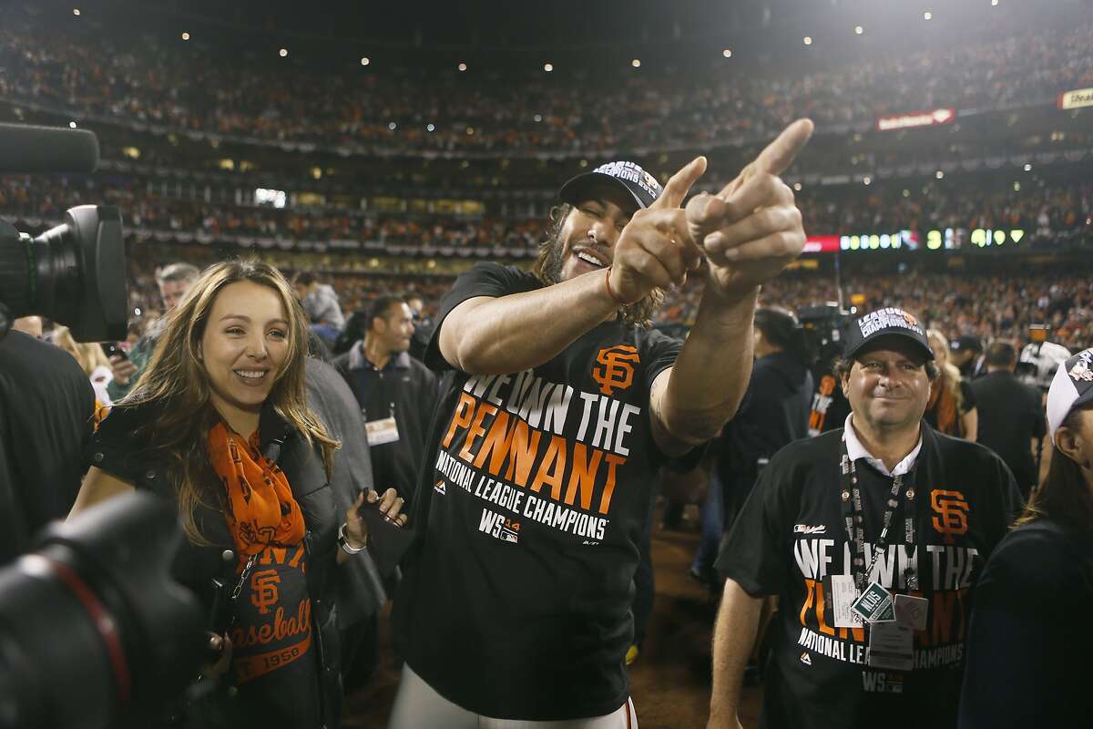 San Francisco Giants celebrate in the locker room after winning the  National League Championship Series against the St. Louis Cardinals in game  5 of the National League Championship at AT&T Park in