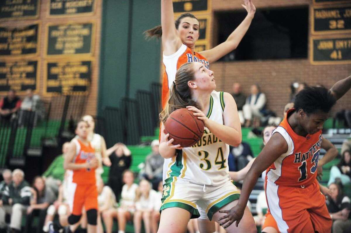 Trinity Catholic's Eileen Ornousky looks to take a shot against Danbury in the quarterfinals of the FCIAC girls basketball championship in Stamford, Conn. on Saturday, Feb. 20, 2010.