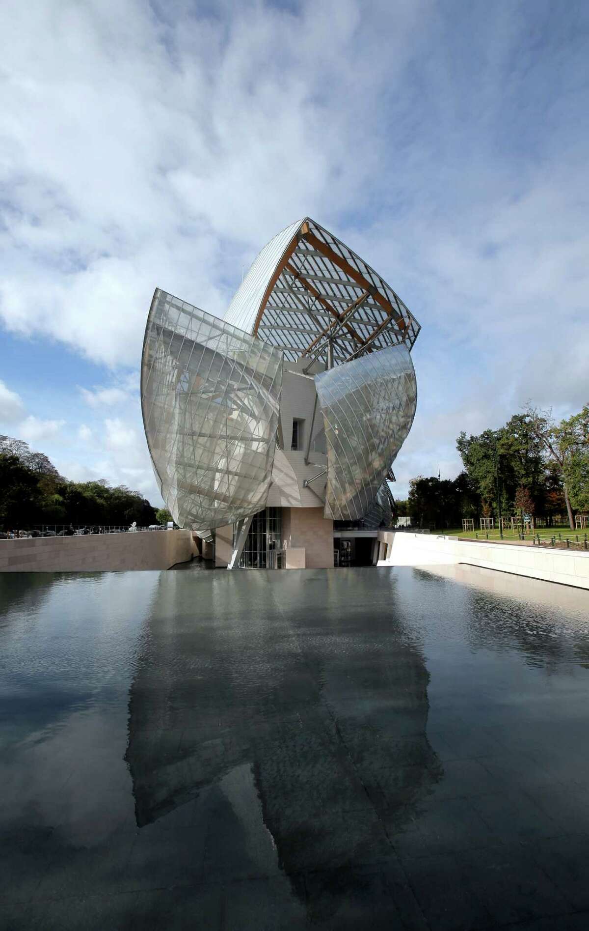 The $127 million Louis Vuitton Foundation art museum and cultural center created by architect Frank Gehry has been compared to an iceberg or giant sailboat.