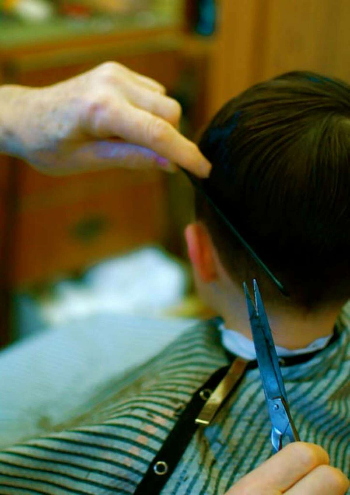 Colonial haircutters 296,000 haircuts, give or take