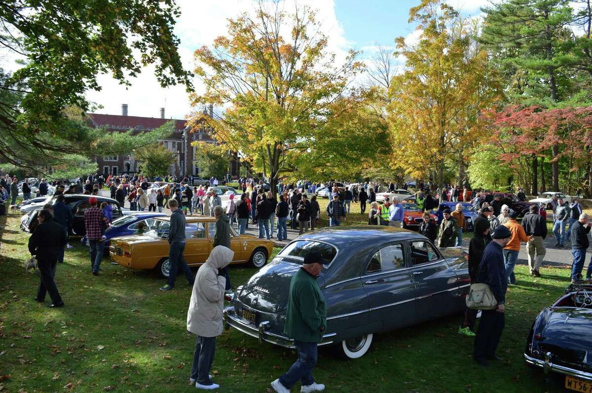 A large crowd turned out Sunday for the latest Caffeine $ Carburetors car show, which moved from downtown to Waveny Park for the first time.