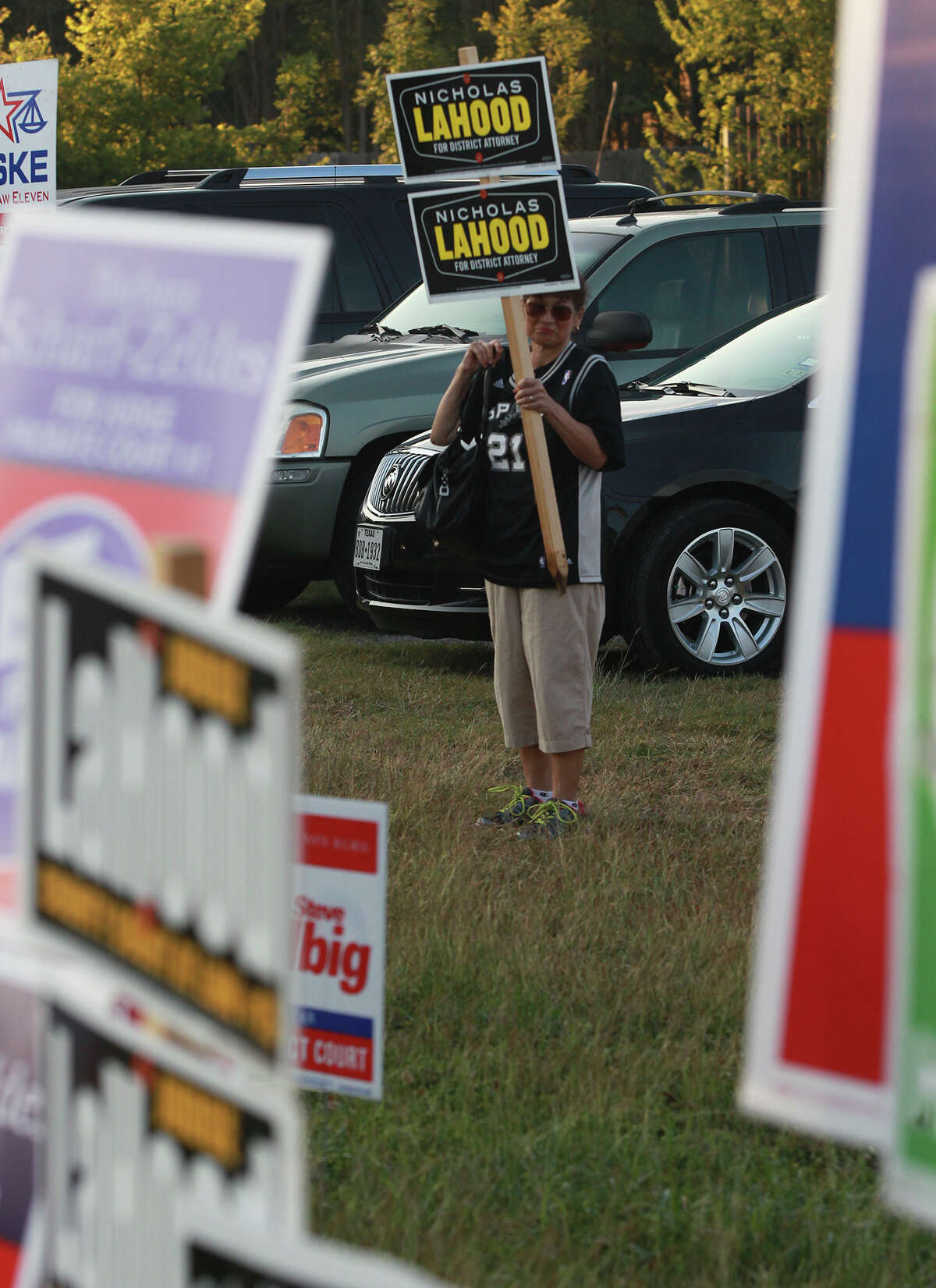 Norma LaHood, mother of District Attorney candidate Nicholas LaHood, stands Monday October 20, 2014 on the first day of early voting. LaHood was at the Brook Hollow Branch of the San Antonio Public Library.