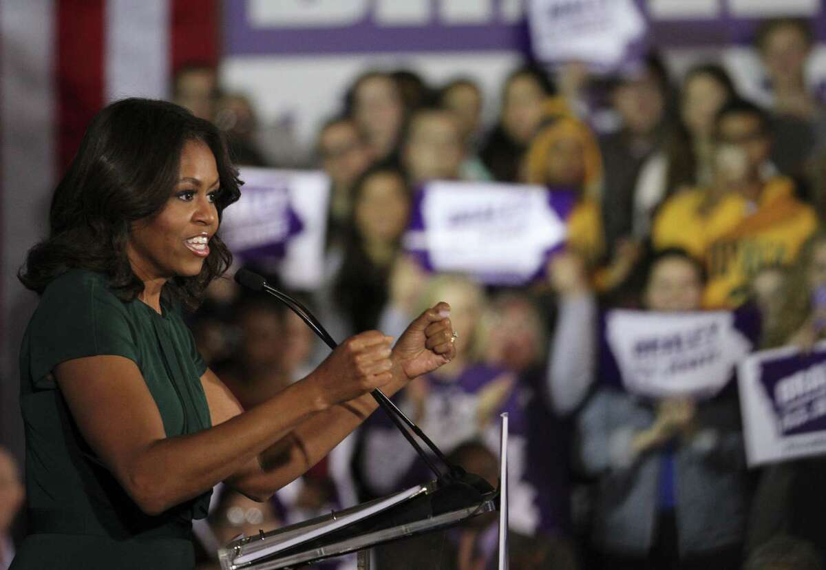First lady Michele Obama campaigns for Iowa Democratic Senate candidate Bruce Braley during a rally at the University of Iowa, Oct. 21, 2014, in Iowa City, Iowa.