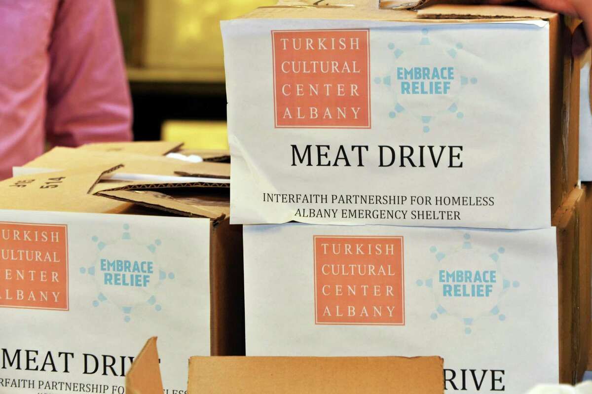 Albany Emergency Center receives 100 pounds of packaged beef cutlets from Turkish Cultural Center Albany for their Meat Drive, dedicated to the Feast of Sacrifice (Eid al Adha) in partnership with Embrace Relief Foundation Wednesday Oct. 22, 2014, in Albany, NY. (John Carl D'Annibale / Times Union)