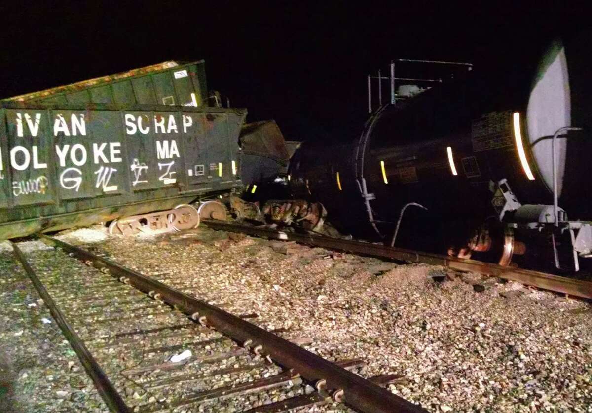 Railcars are derailed Wednesday night, Oct. 23, 2014, at the CSX yard in Selkirk, N.Y. (Sheriff Craig Apple)