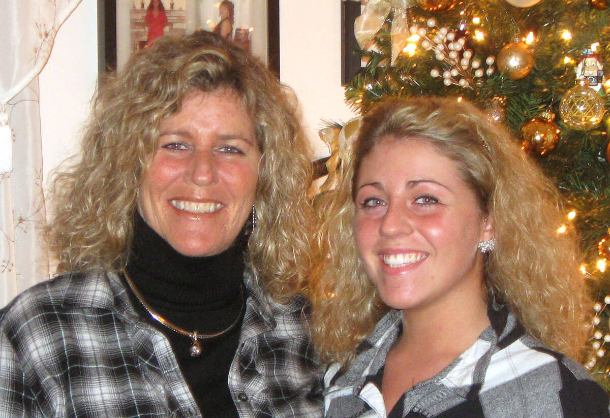Patty Farrell, left, and her late daughter, Laree Farrell-Lincoln are pictured next to their Christmas tree in a undated photo. Laree died of a heroin overdose at her mother's home March 16, 2013. (Courtesy Patty Farrell)
