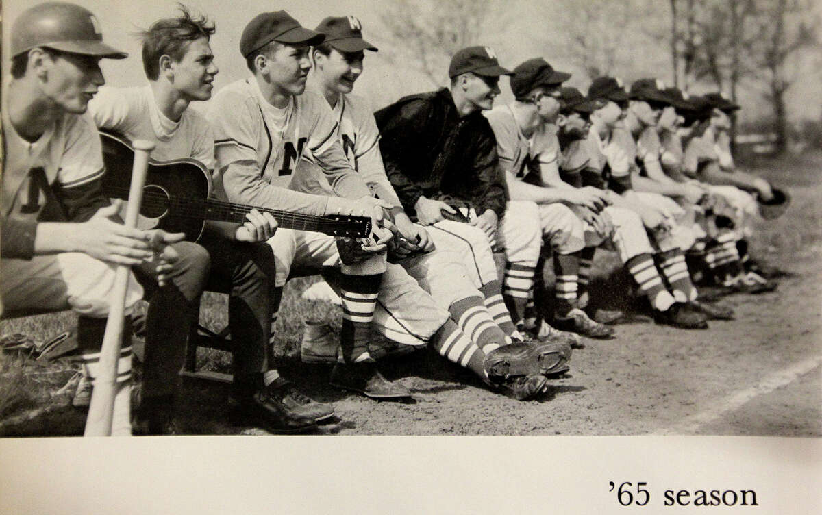 San Antonio Spurs head coach Gregg Popovich , third from left, sits on the bench with the Merrillville High School baseball team in this yearbook photo. Popovich was born in East Chicago but grew up in Merrillville, Indiana. To the left with guitar is his best friend Arlie Pierce. They were both best man at their weddings.