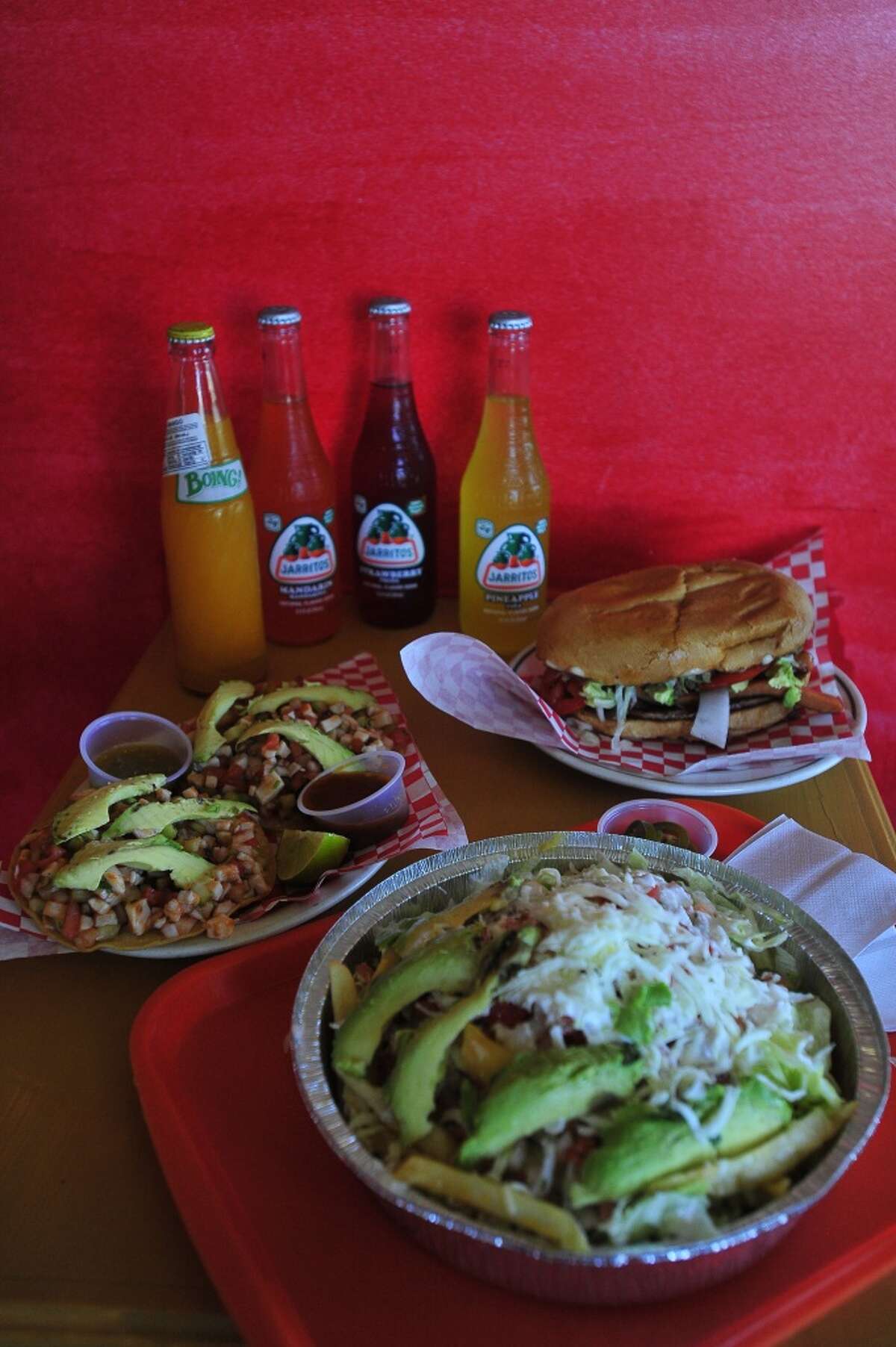 From left, Mexican favorites, such as ceviche tostadas azada fries ,a torta Hawaiianna and fruity sodas are available at La Salsitas, a 24-hour Mexican restaurant that recently opened a new location on College Street in Beaumont. Photo taken Thursday, October 16, 2014 Kim Brent/@kimbpix