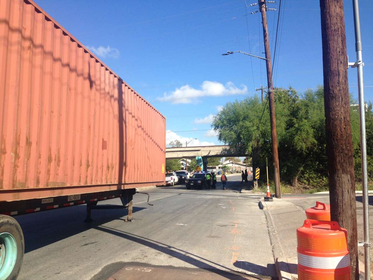 South Hackberry was shut down Monday morning after an 18-wheeler struck a bridge near Westfall Avenue.