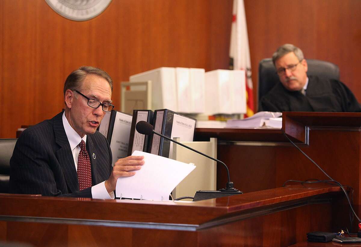 Superior court judge Curtis E.A. Karnow (right) listens to witness chancellor Brice W. Harris in the CCSF trial at the California State Superior Courthouse in San Francisco, Calif., on Monday, October 27, 2014.