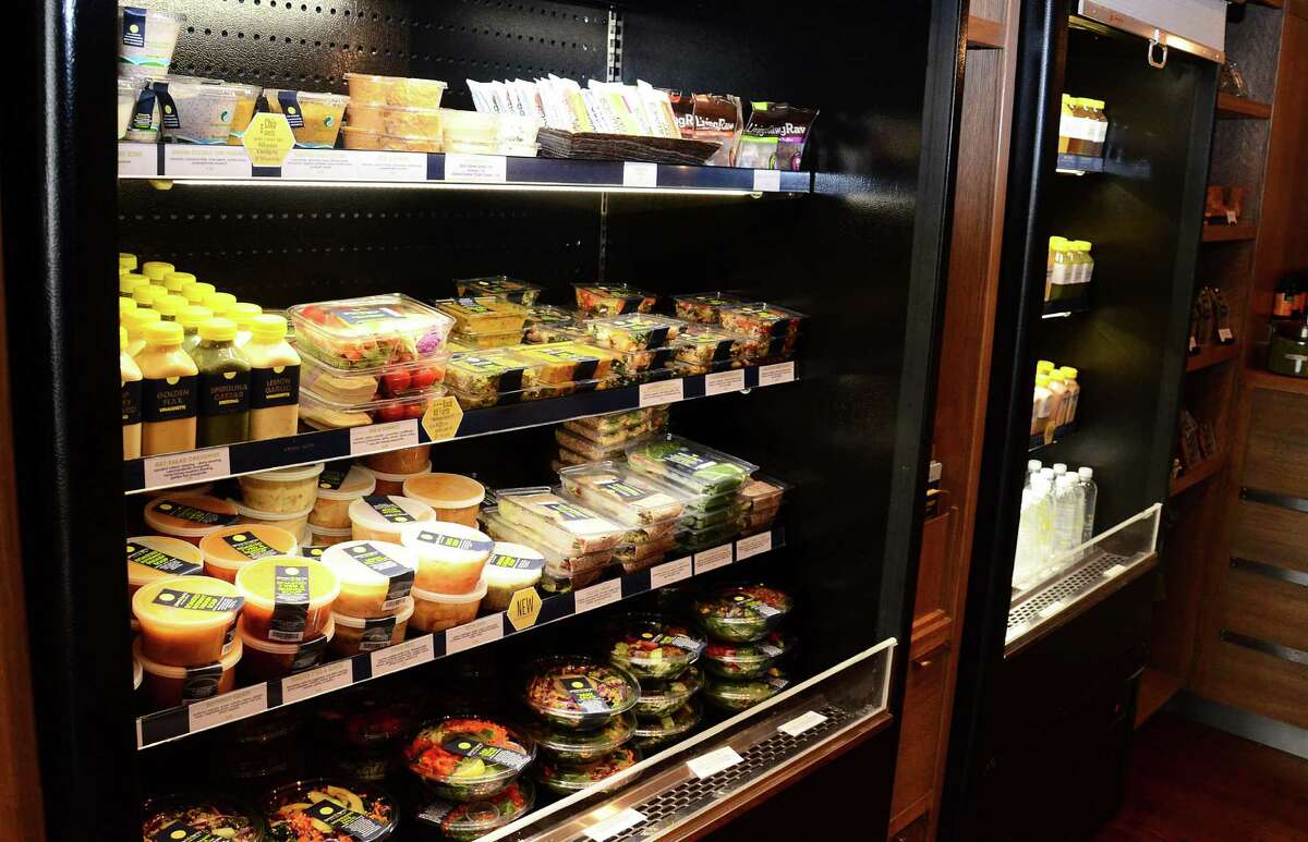 Grab-and-go snacks, salads and juices line the refrigerated display case at Green & Tonic's newest location -- 5 Burtis Ave., New Canaan, Conn.