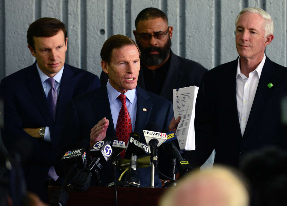 U.S. Senator Richard Blumenthal (D-Conn.) speaks to the media about the report released by the National Transportation Safety Board and its findings in the five major accidents involving Metro-North Railroad, during a press coference held at the Bridgeport Metro-North Railroad station in downtown Bridgeport, Conn. on Tuesday October 28, 2014. Behind Senator Blumenthal at left is U.S. Senator Chris Murphy (D-Conn.), State Representative Charles "Don" Clemons, Jr. (D-Bridgeport), and Bridgeport Mayor Bill Finch, right. Also present but not pictured is U.S. Congressman Jim Himes (D-4).