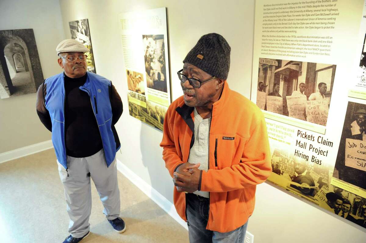 Persell McDowell, left, and Earl Thorpe, both former members of The Brothers talk about the exhibit honoring that movement on Tuesday, Oct. 28, 2014, at King's Place in Albany, N.Y. (Cindy Schultz / Times Union)