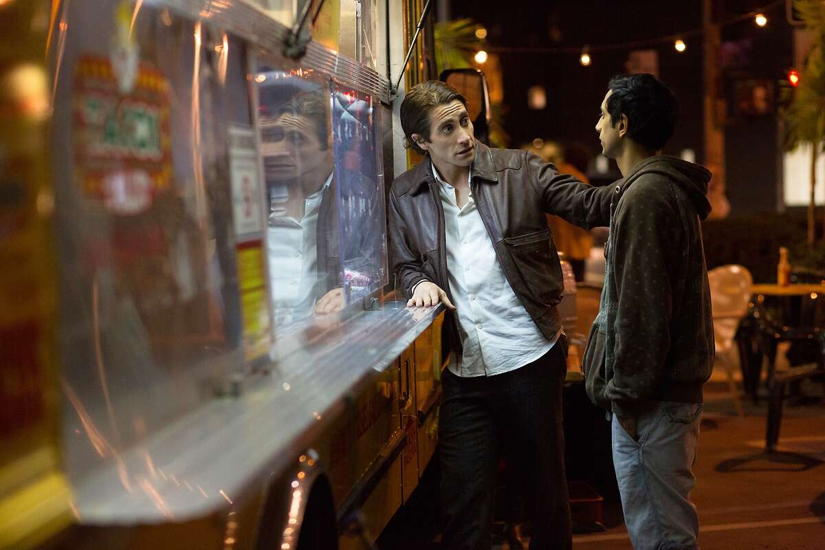 In this image released by Open Road Films, Jake Gyllenhaal, left, and Riz Ahmed appear in a scene from the film, "Nightcrawler." (AP Photo/Open Road Films, Chuck Zlotnick)