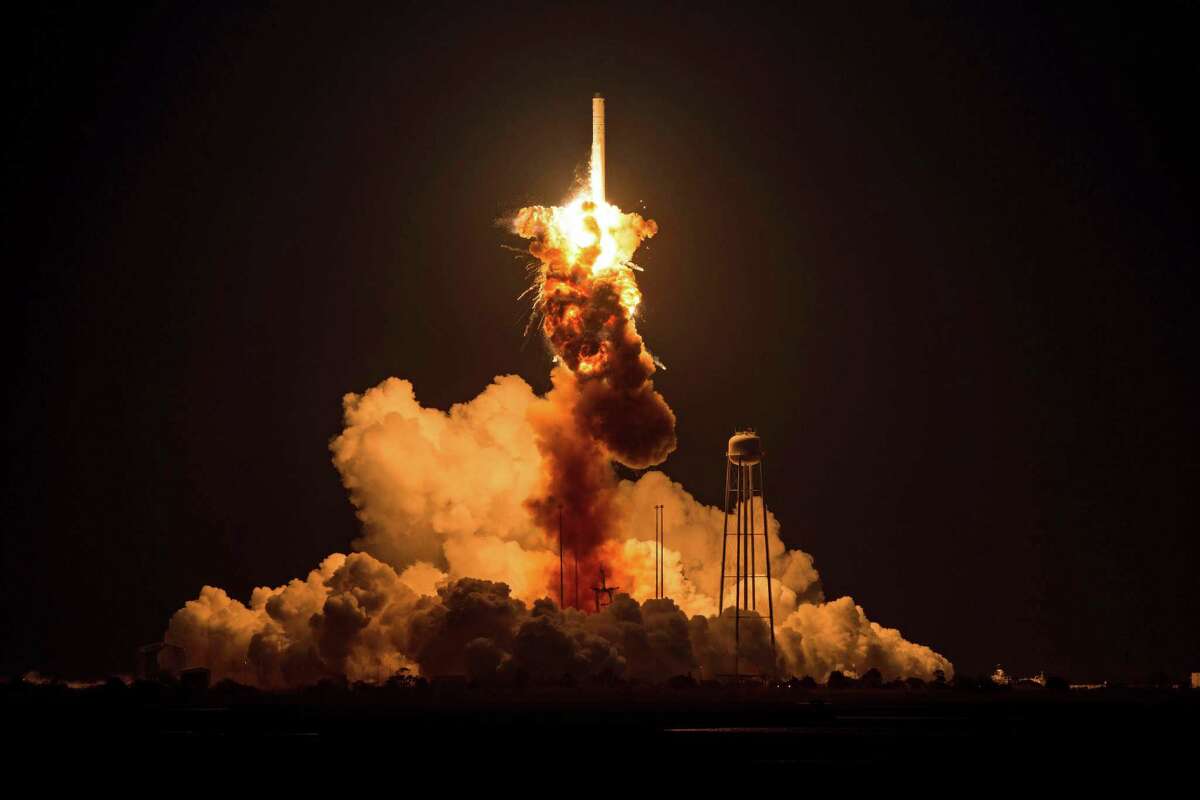 An unmanned Antares rocket explodes seconds after liftoff Tuesday at NASA’s Wallops Flight Facility in Virginia.