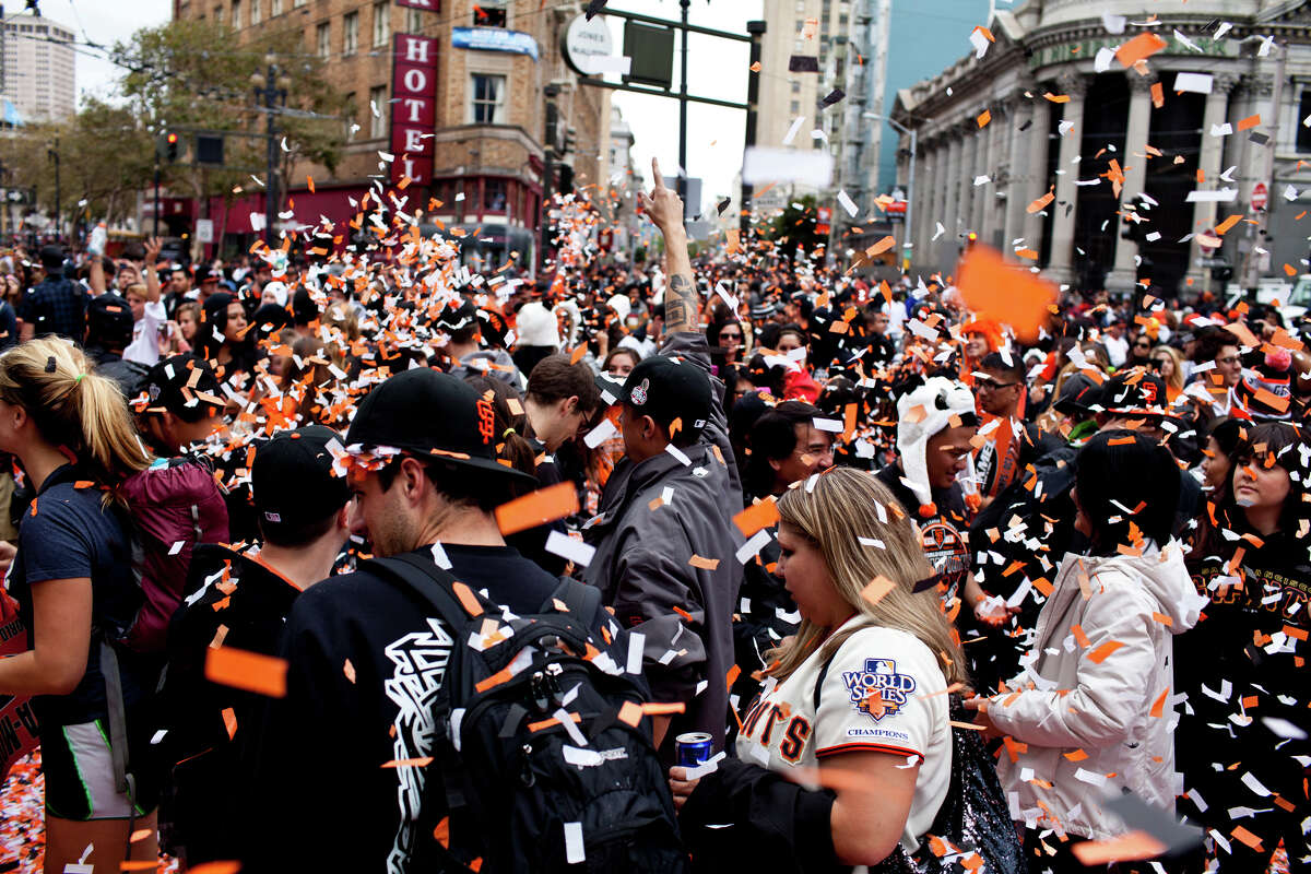 Fans party during the parade that followed the Giants’ 2012 World Series Championship on Oct. 31, 2012, in San Francisco.