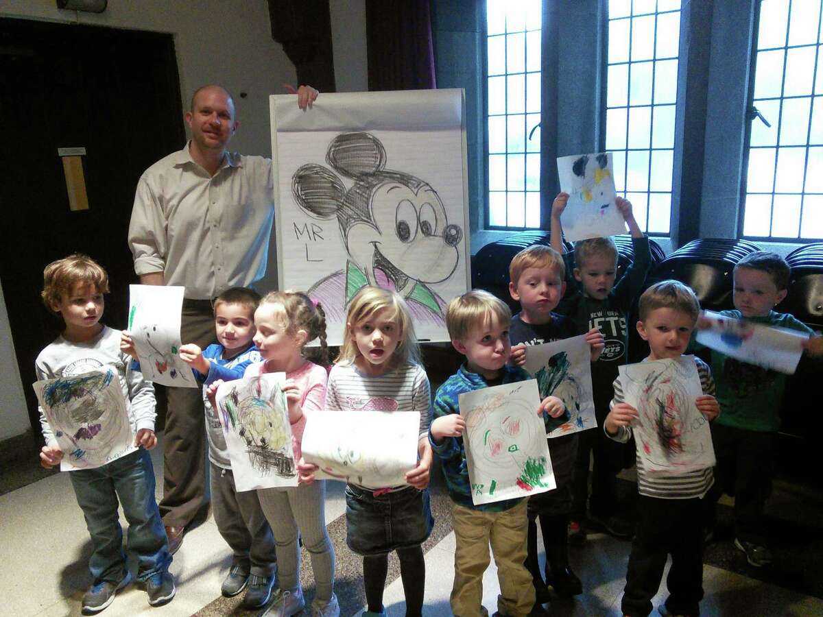 Local graphics and art instructor, Phil Lohmeyer, came to First Church Preschool on recently, to do a cartooning workshop with 4- and 5-year olds. The children learned to draw Mickey Mouse.