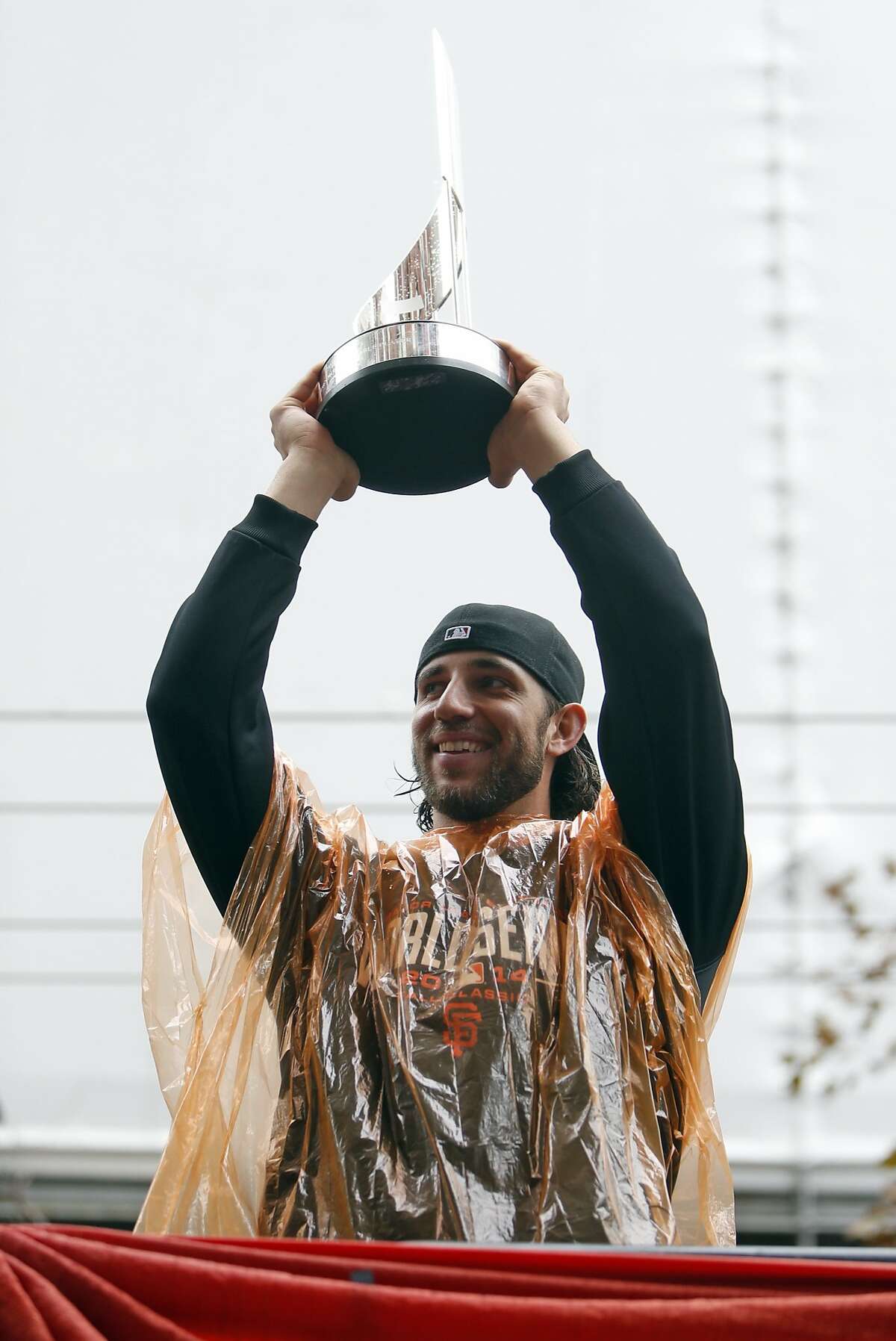 Giants’ parade Pence leads cheers; Hudson skips across stage