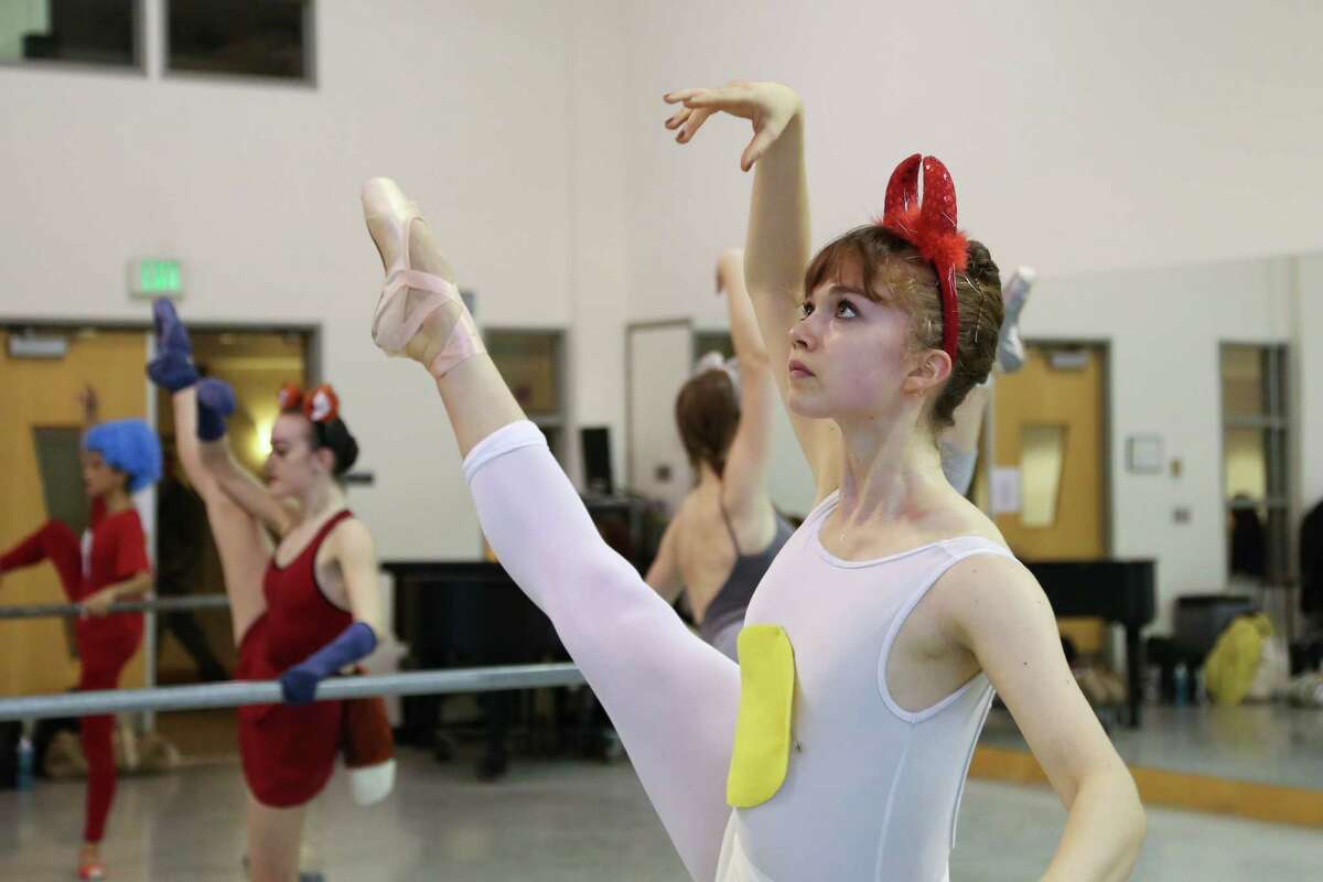 Mikayla Lambert, 18, dresses up as a "deviled egg" during dance practice. Students of the Pacific Northwest Ballet School's Professional Division abandoned their strict dress codes to dress up in the spirit of Halloween for their morning class on Friday, Oct. 31, 2014 in Seattle, WA.