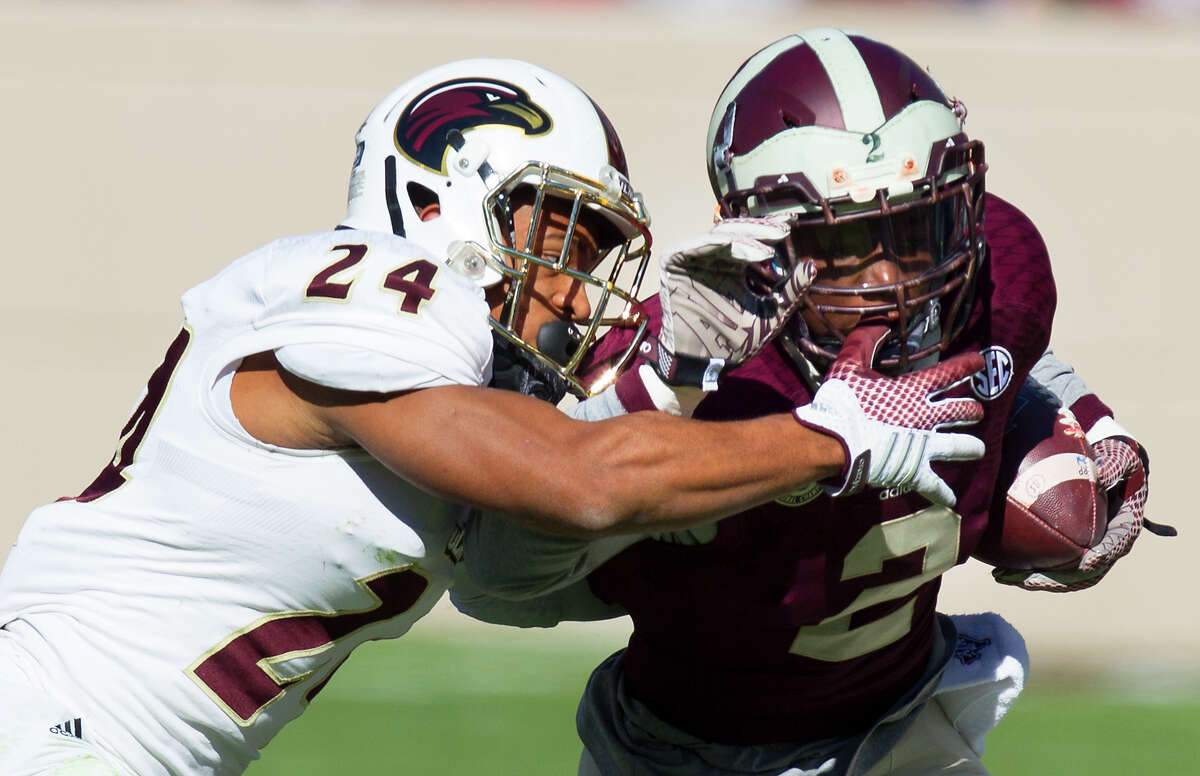 Louisiana Monroe Warhawks cornerback Trey Caldwell pressures Texas A&M Aggies wide receiver Speedy Noil, during the first half of an NCAA college football game against the Louisiana Monroe Warhawks, at Kyle Field, Saturday, Nov. 1, 2014, in College Station.