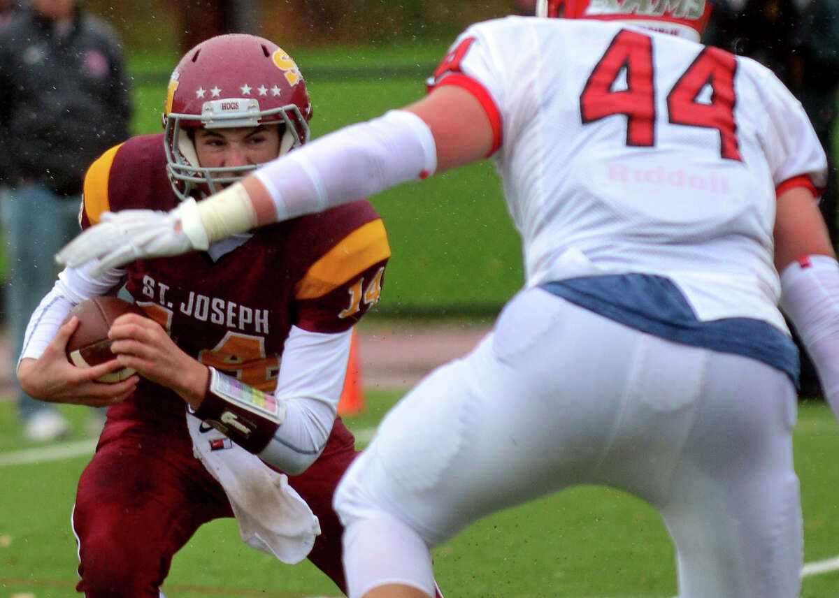 Football action between new Canaan and St. Joseph in Trumbull, Conn. on Saturday, November 1, 2014.
