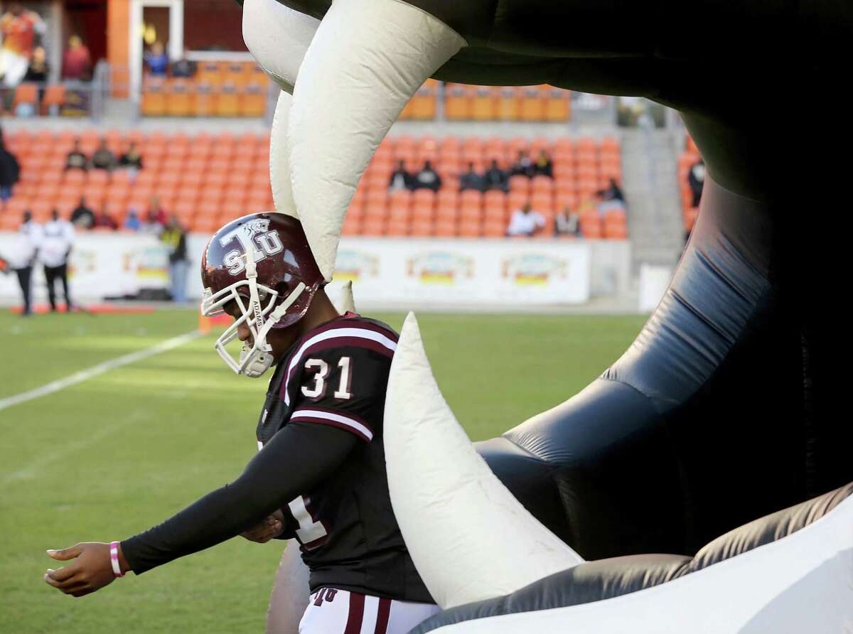 Texas Southern Tigers place kicker Cory Carter (31) walks onto the field before playing Grambling State Tigers in the fist half on November 1, 2014 at BBVA Stadium in Houston, TX.