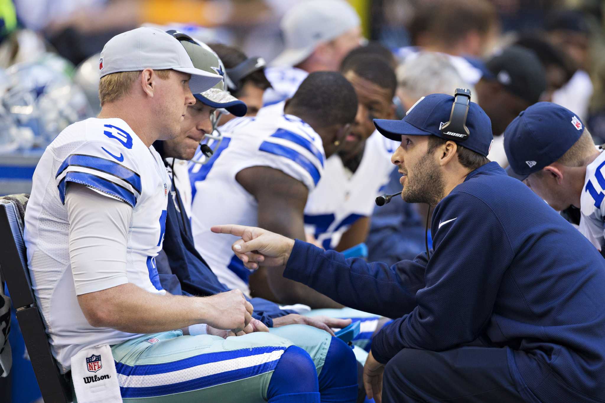 Tony Romo has broken bone in his back, says Cowboys coach Jason Garrett