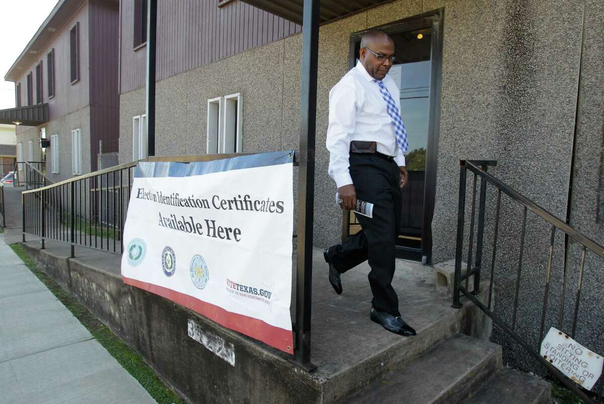 Delrick Brown leaves the Election Identification Certificates station at Holman Street Baptist Church after being told he needed more documents to get a photo ID to vote Tuesday.