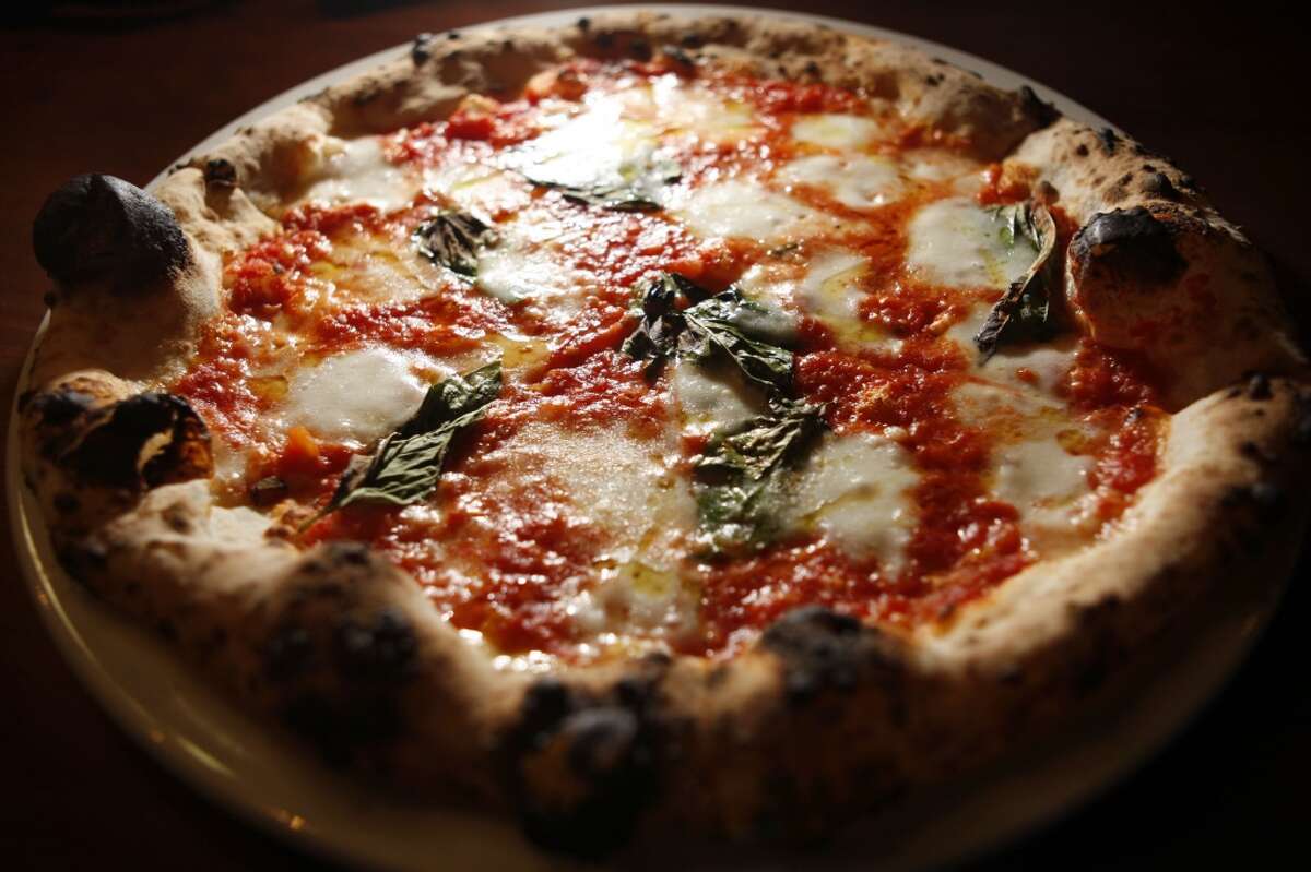GALLERY: Signature pizzas in 21 SF neighborhoods MISSION: Flour + Water. The highly praised restaurant 'sets standards for wood-oven Neapolitan style in the Bay Area,' said the Chron's Michael Bauer in his effusive 2009 review. 2401 Harrison @ 20th.