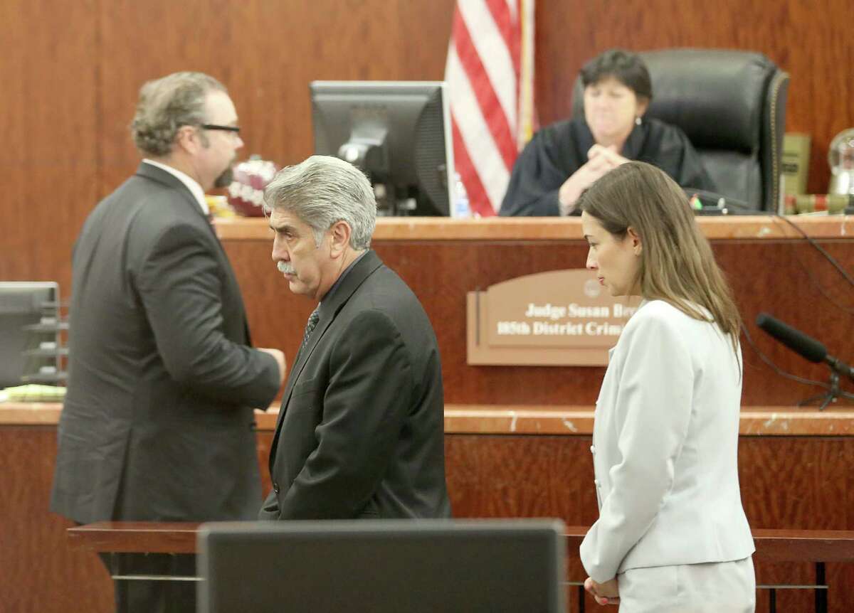 Constable Victor Trevino, center, admits that he took money for personal use from a charity he founded.﻿