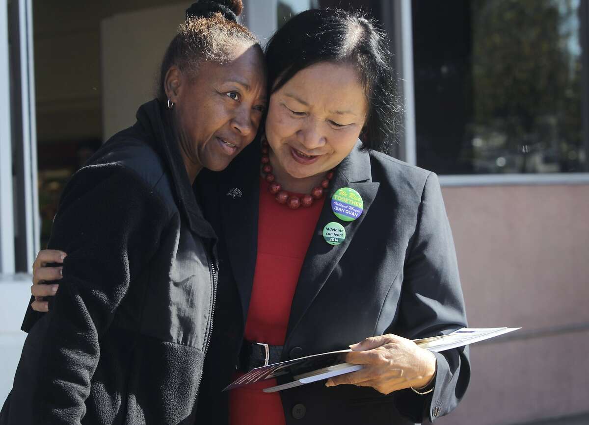 Juanita Montemayor hugs Oakland Mayor Jean Quan, who was encouraging grocery store shoppers on 51st Street to vote on Election Day in Oakland, Calif. on Tuesday, Nov. 4, 2014.