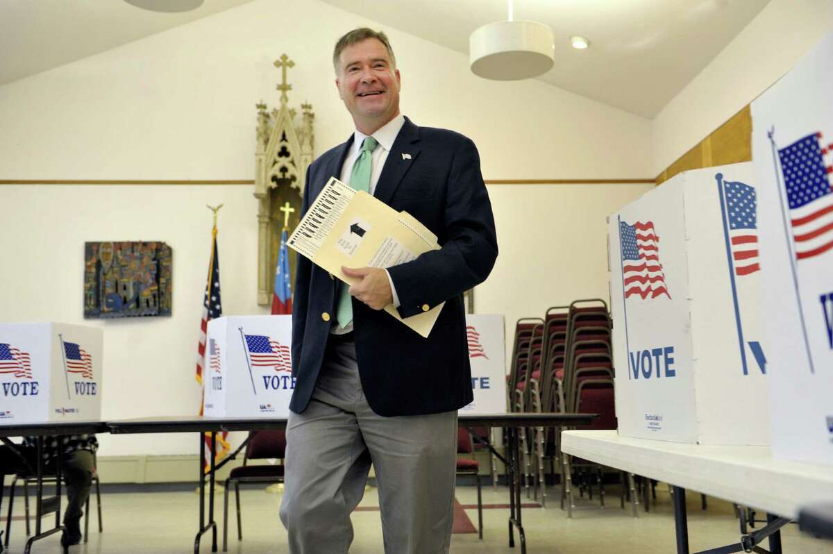Congressman Chris Gibson walks over to insert his ballot into the voting machine at St. Paul's Episcopal Church on Tuesday, Nov. 4, 2014, in Kinderhook, N.Y. (Paul Buckowski / Times Union)