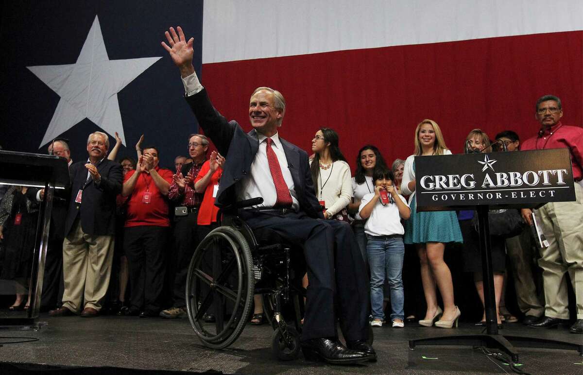 Texas Governor elect Greg Abbott waves to the audience at the GOP election night party in Austin on Tuesday, Nov. 4, 2014.