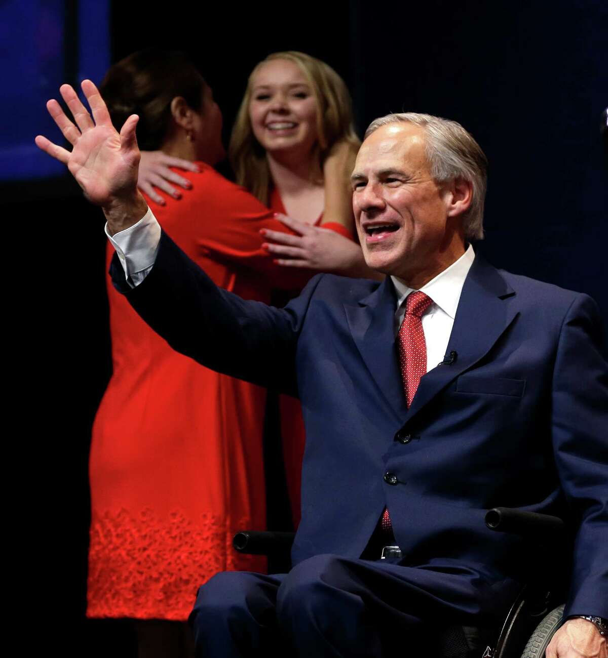 Texas Attorney General and Republican candidate for governor Greg Abbott waves to the crowd before his victory speech Tuesday, Nov. 4, 2014, in Austin, Texas. Abbott defeated Democrat Wendy Davis to win the race for Texas governor. (AP Photo/David J. Phillip)