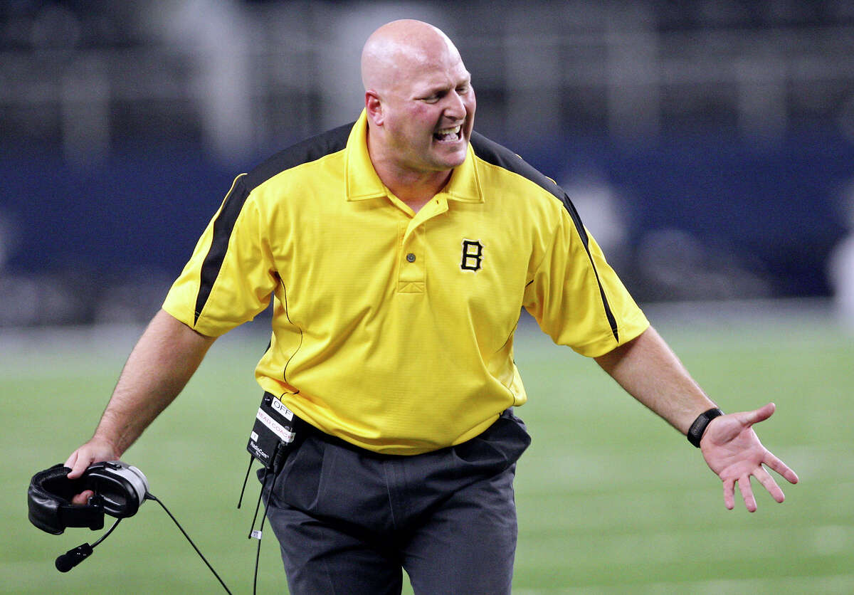 Brennan’s head coach Stephen Basore reacts after a play during second half action of the Class 4A Division I state championship game with Denton Guyer on Dec. 20, 2013 at AT&T Stadium in Arlington.