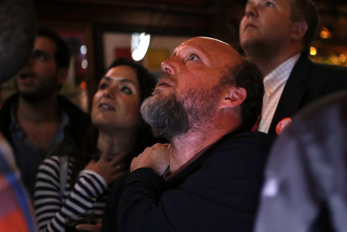 Proposition E campaign manager Todd David watches voting results at Valley Tavern on 24th Street in San Francisco, Calif., on Tuesday, November 4, 2014.
