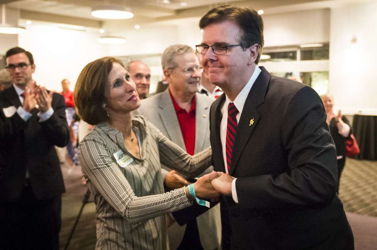 Sen. Lois Kolkhorst congratulates Lt. Gov.-elect Dan Patrick as he takes the stage during an election night watch party in Houston.