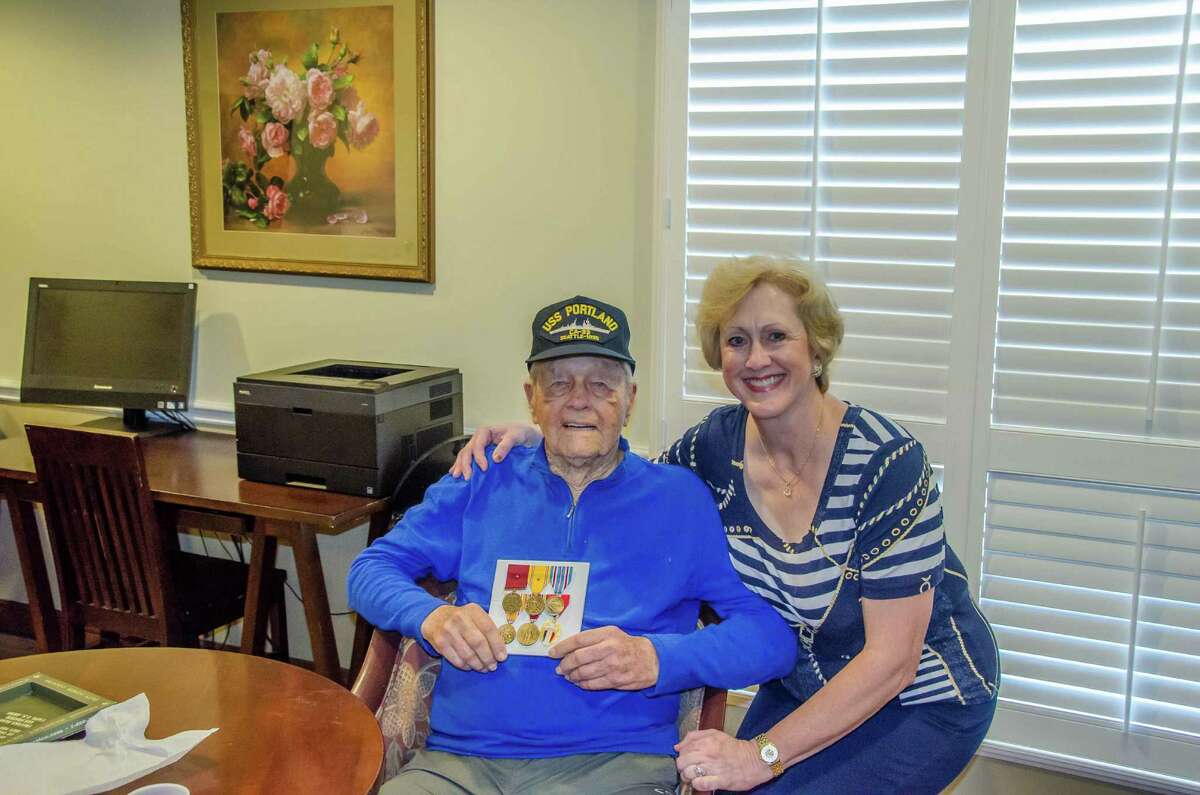 William Speer Jr. is happy to be reunited with his Navy medals, even if the original ones are long gone. Daughter Trisha Pollard helped him get the new set.