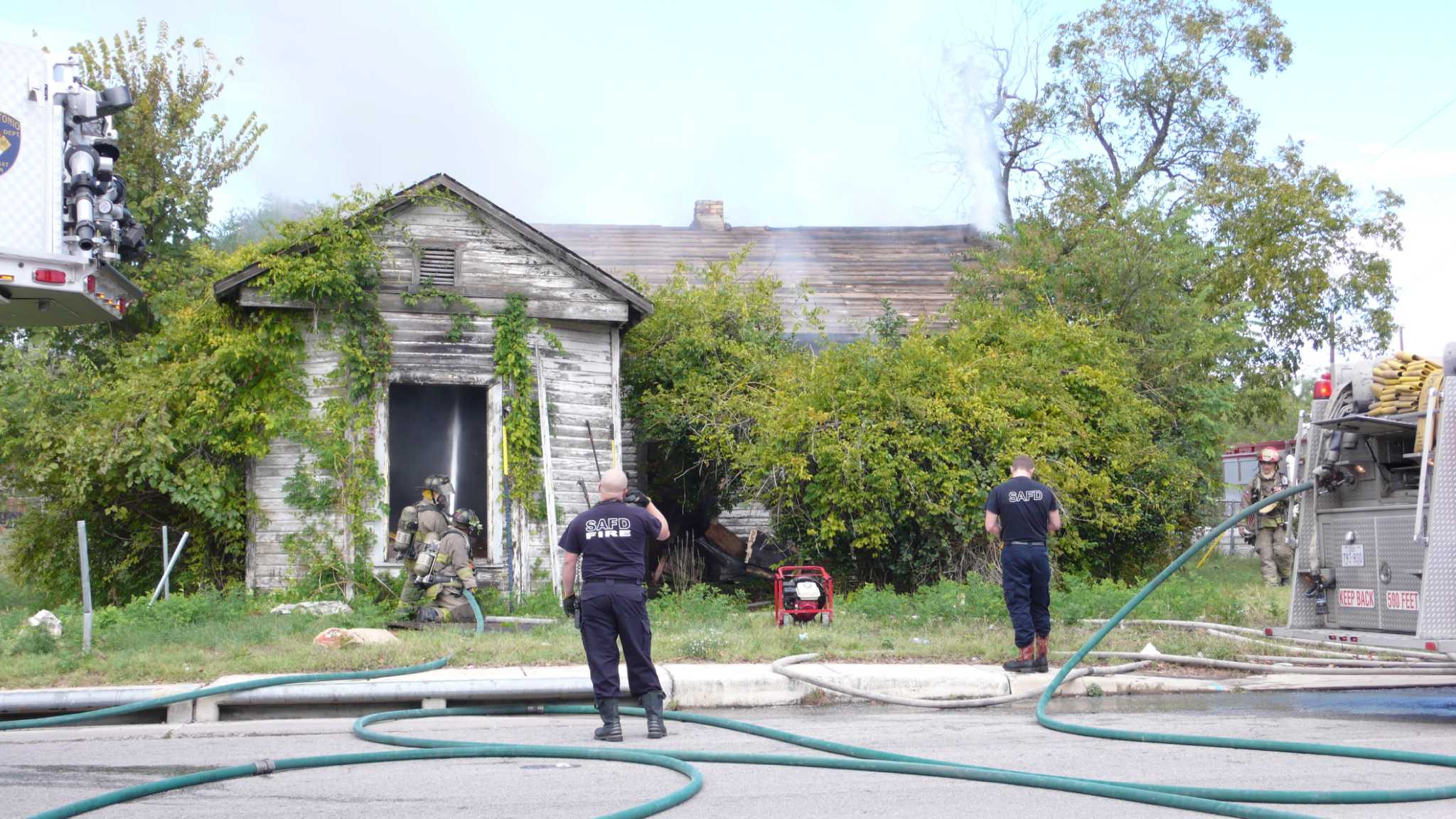 Firefighters battle blaze at abandoned house