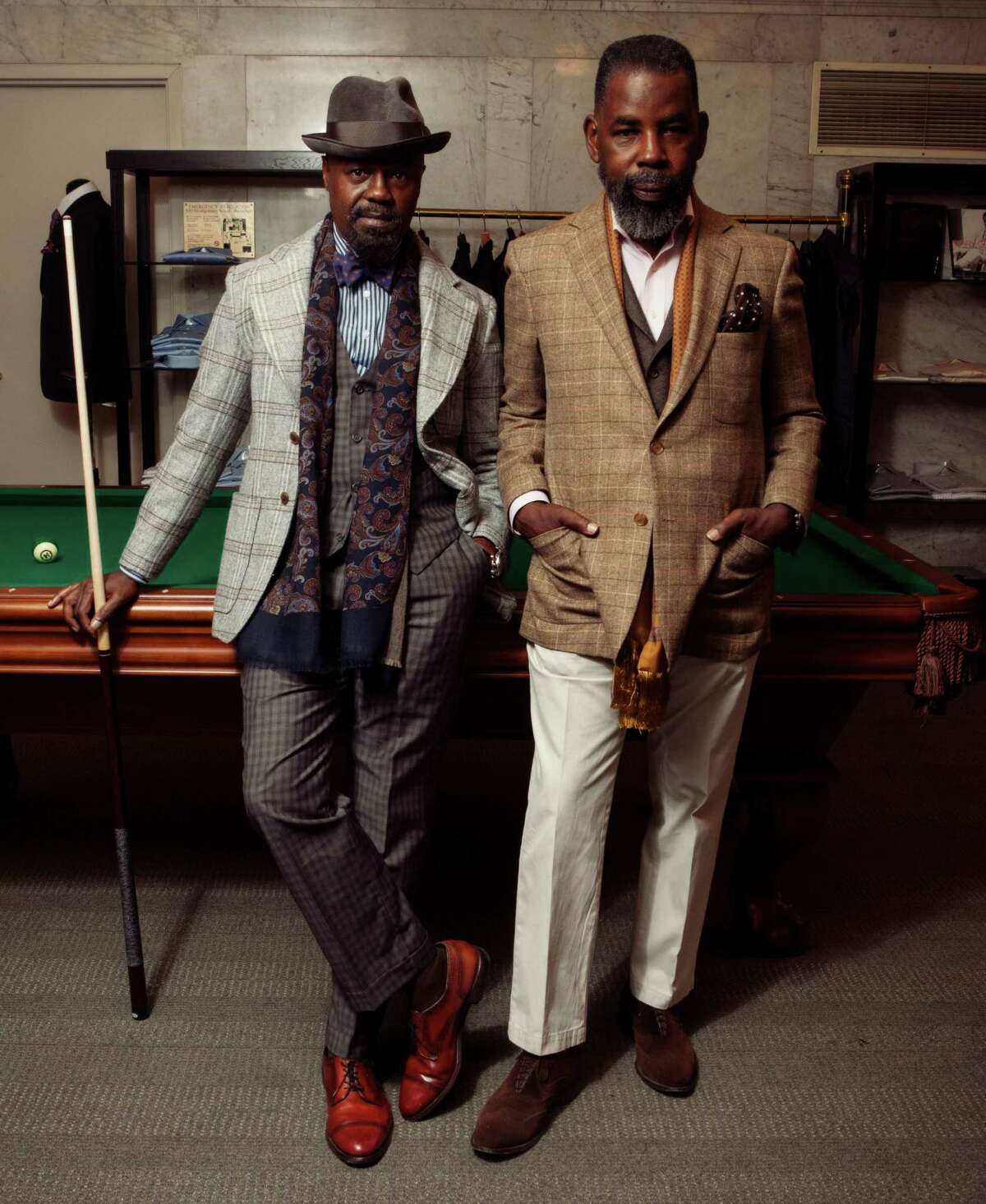 Members of the Neo Dandy Arts Collective meet regularly to share their appreciation of fine menswear. Pictured are members Alvin Lampkins (left) and Kaya Fortune.