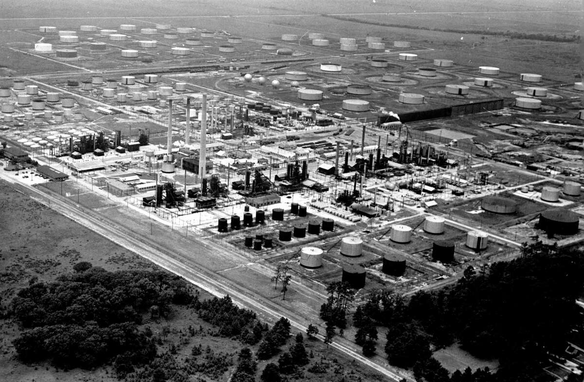July 1941: At Shell's Deer Park refinery, the firm last December produced America's first barrel of toluene, a base for explosives, from petroleum. The $500,000 toluene plant is in the center of the photo, just behind and to the right of the three tallest towers. Shell has announced construction of a second and idential toluene unit, also to cost $500,000.
