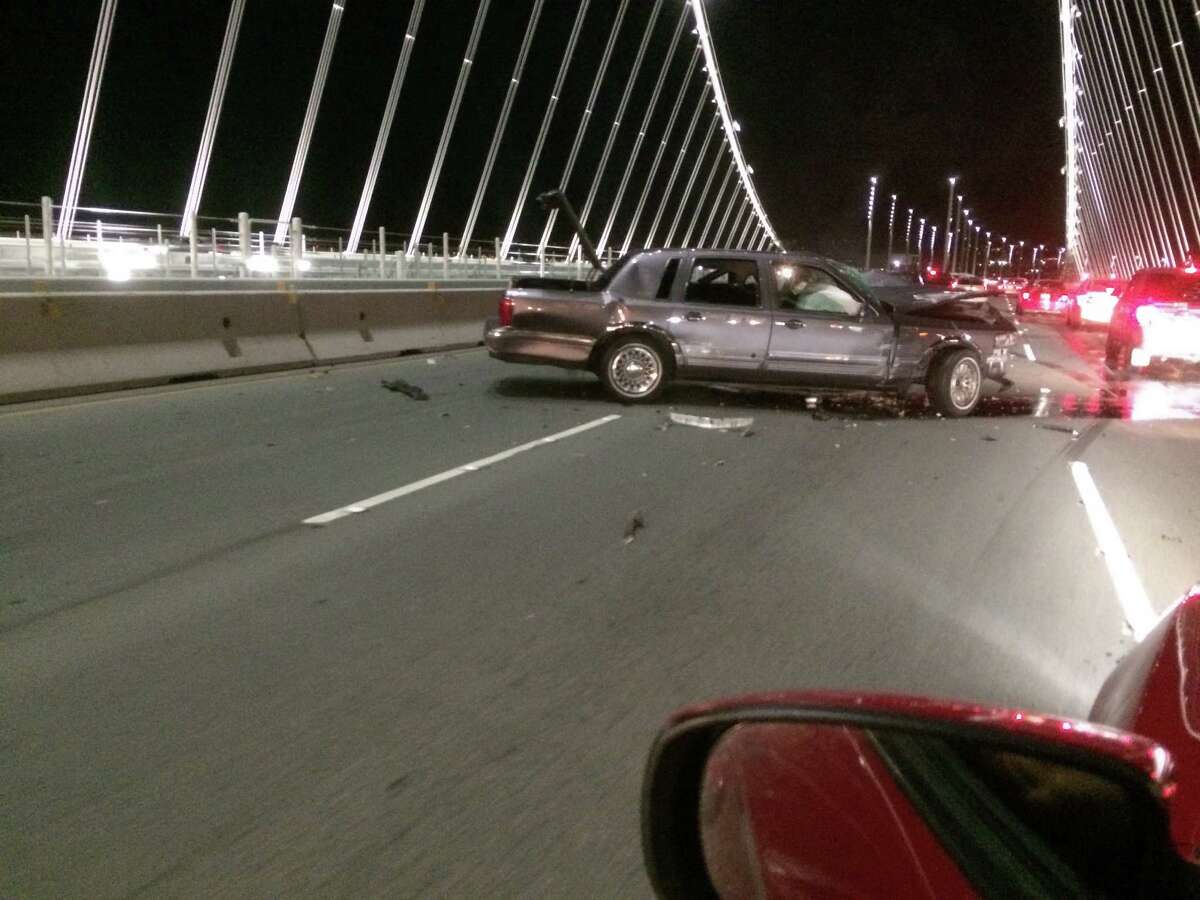 A driver took pictures of a head-on wreck Saturday night on the Bay Bridge that injured three and snarled traffic for hours.
