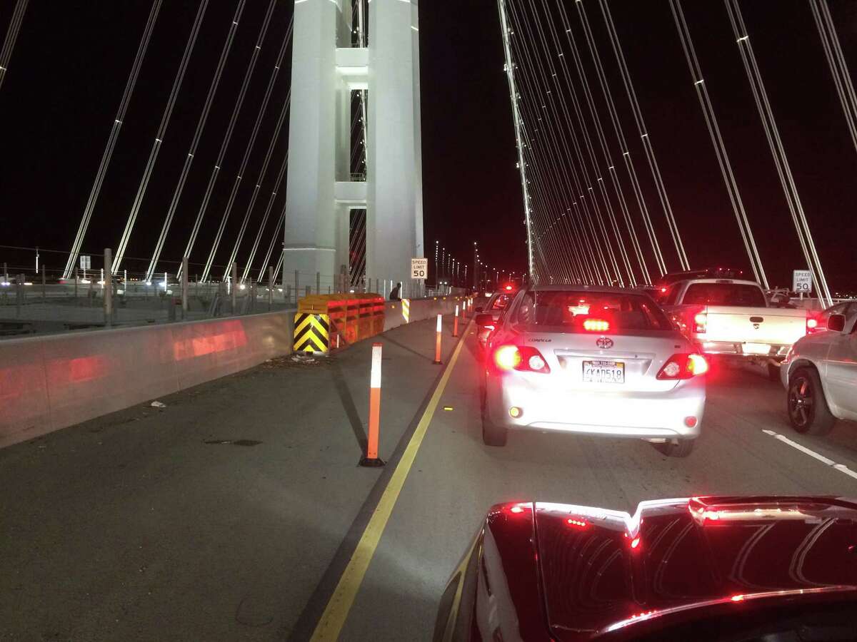 A woman who was high on drugs and driving the wrong direction on the Bay Bridge slammed head-on into another motorist Saturday night, causing a major wreck that injured three people and backed up traffic for hours, the California Highway Patrol said.