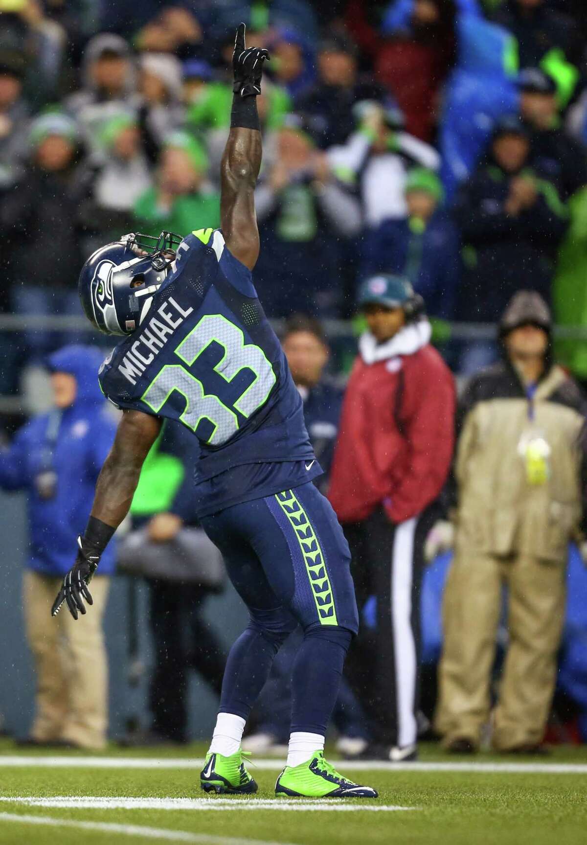 Seattle Seahawks player Christine Michael points skyward after making a play against the New York Giants on Sunday, November 9, 2014 at CenturyLink Field in Seattle.