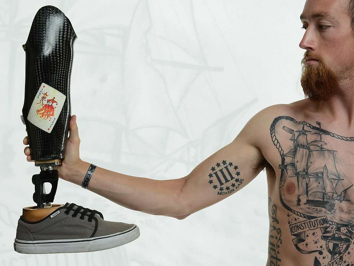 Veterans' tattoos tell us our tales of war