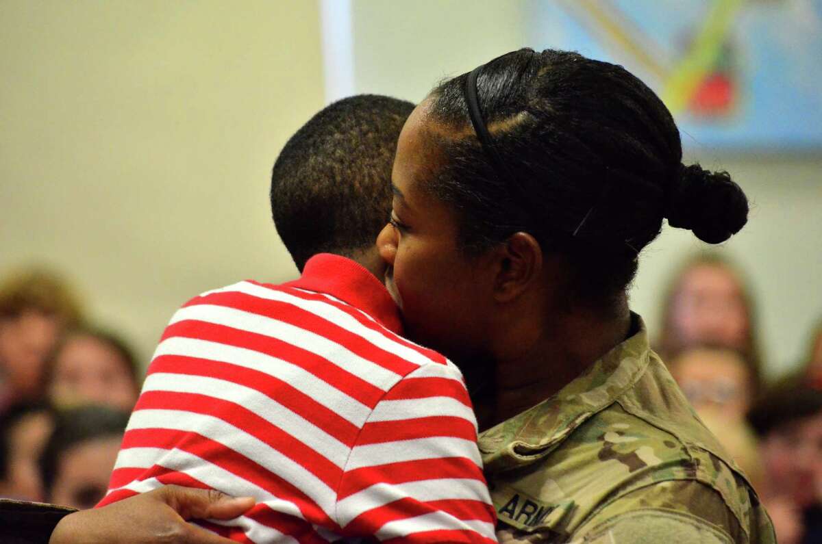 Spc. Crystal Merise, of the U.S. Army, surprised her son Sincere Francois during the Hindley Elementary School Veterans' Day Ceremony. She had just come home early from a year-long tour in Afghanistan and wasn't supposed to be home until the day before Thanksgiving.
